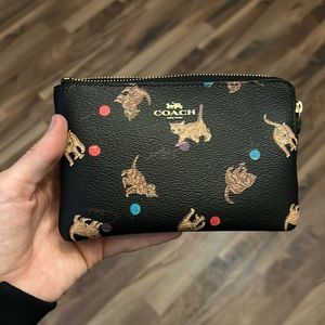 Coach cat pattern wristlet and lanyard